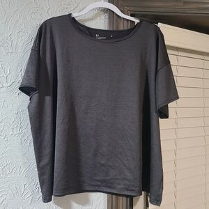 Under Armour HeatGear women's workout shirt featuring an open-back 2x